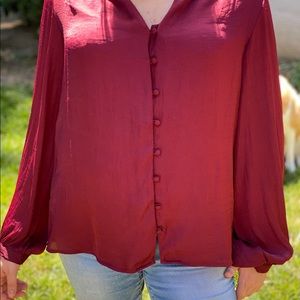 Red button up billowing sleeves. Silk